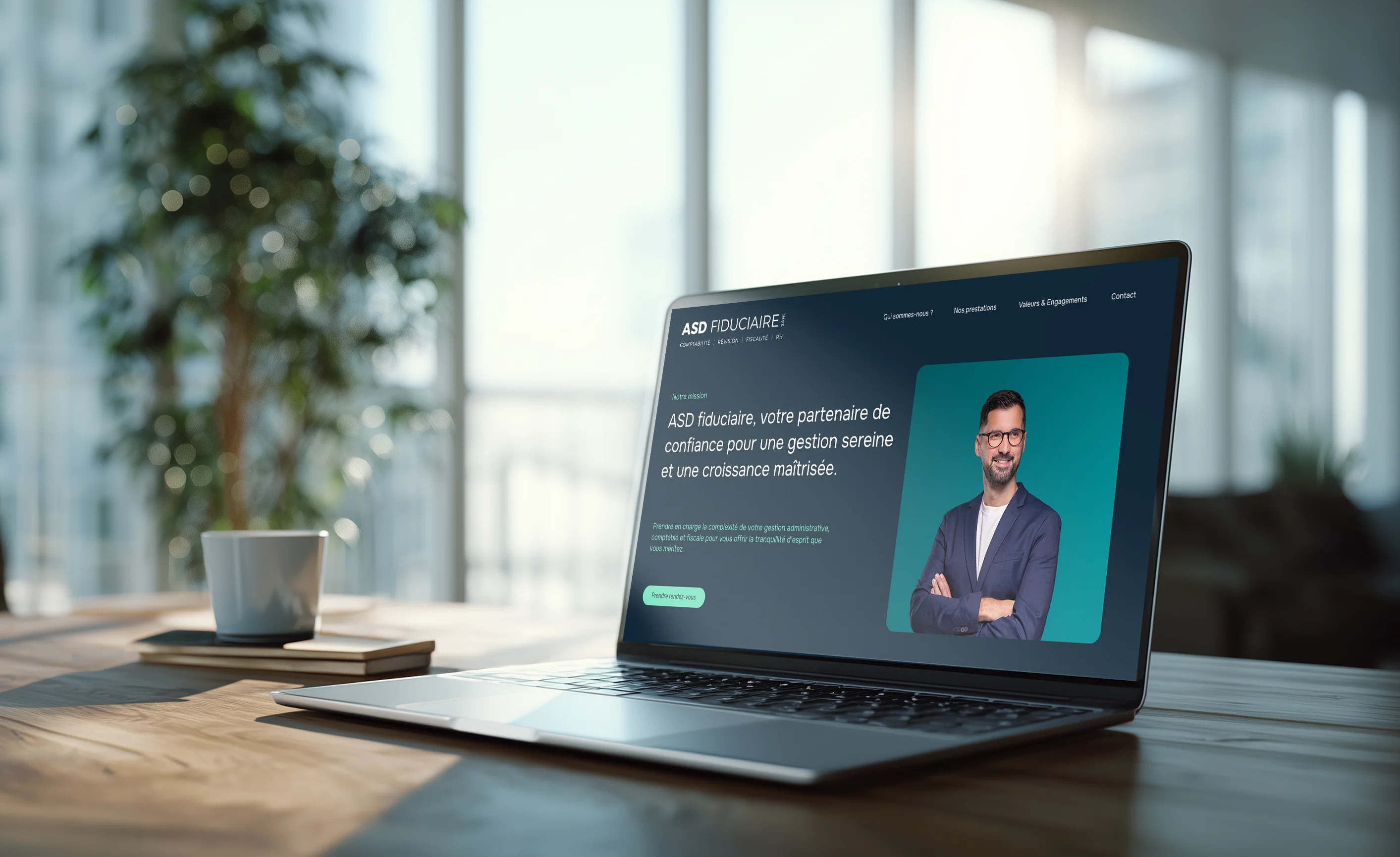 Réalisation Smart Impact | site ASD Fiduciaire sur laptop